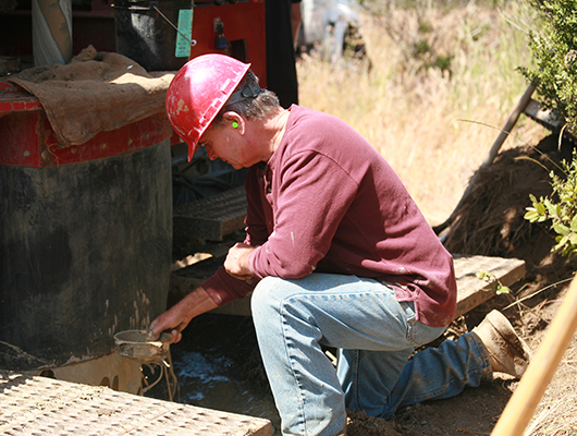 Ed Fisch inspecting drilling chips